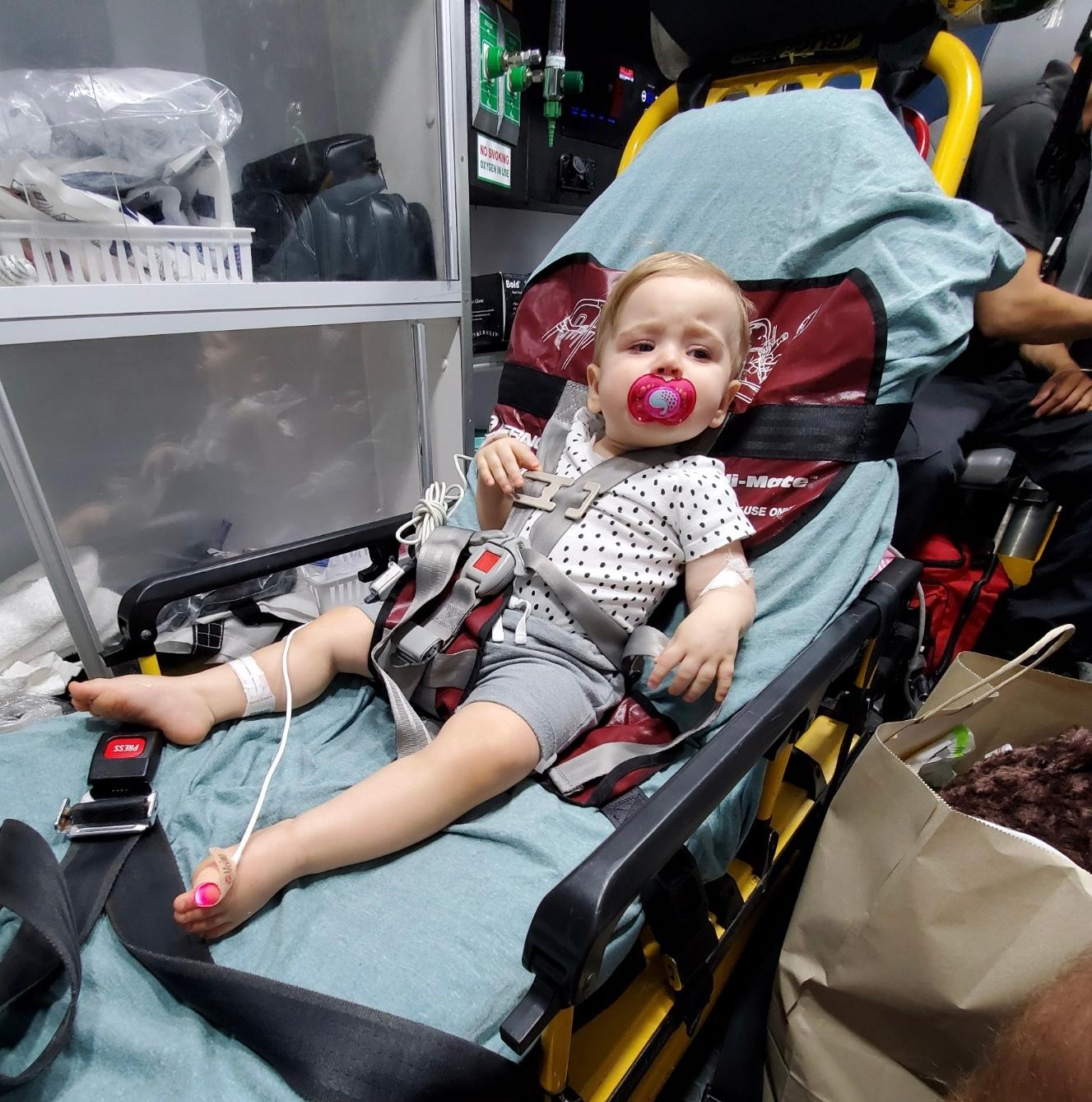 Ellie was transferred between hospitals during one of her severe urinary tract infections. (Photo by Pless family)